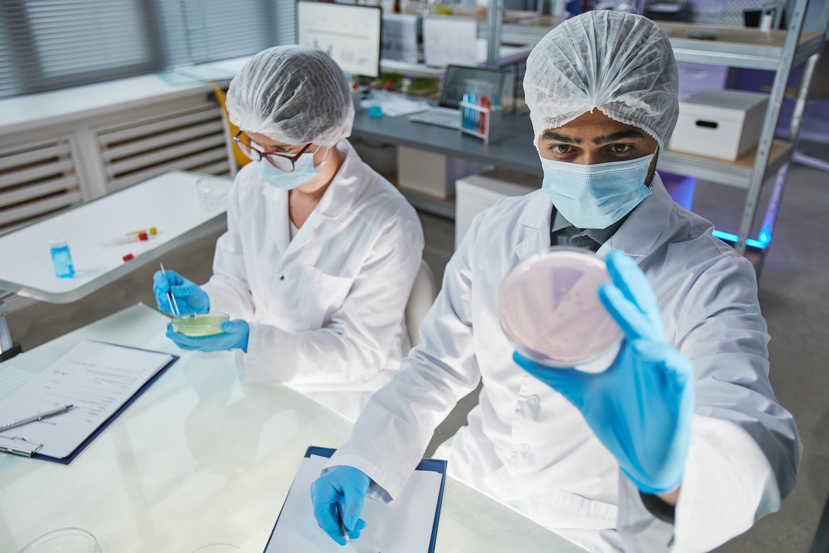 Scientists examining virus in the lab