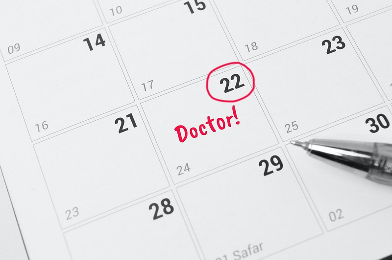Calender with date highlight for doctor appointment.
